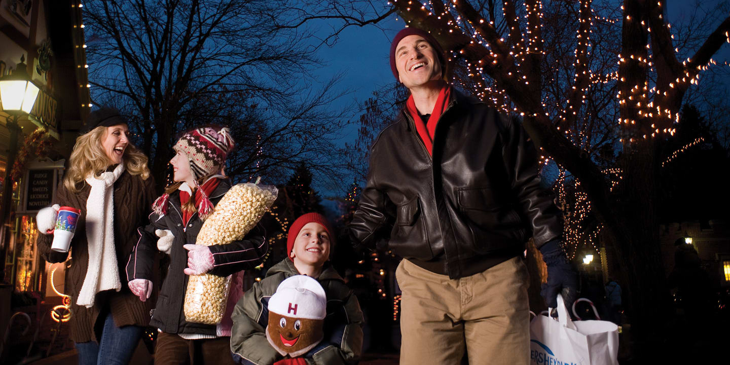 Family In Winter Coats Walking Through Hersheypark Christmas Candylane Family In Winter Coats Walking Through Hersheypark Christmas Candylane