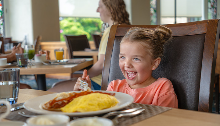 Kid eating breakfast at The Circular