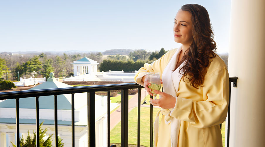 Two women sitting in robes eating lunch at The Hotel Hershey.