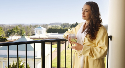 Woman on balcony at Chocolate Spa