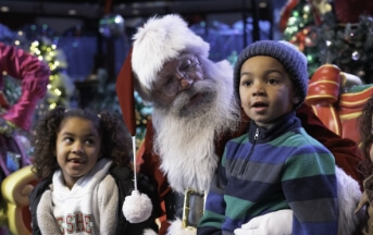 Kids sitting on Santa's lap at Hersheypark Christmas Candylane